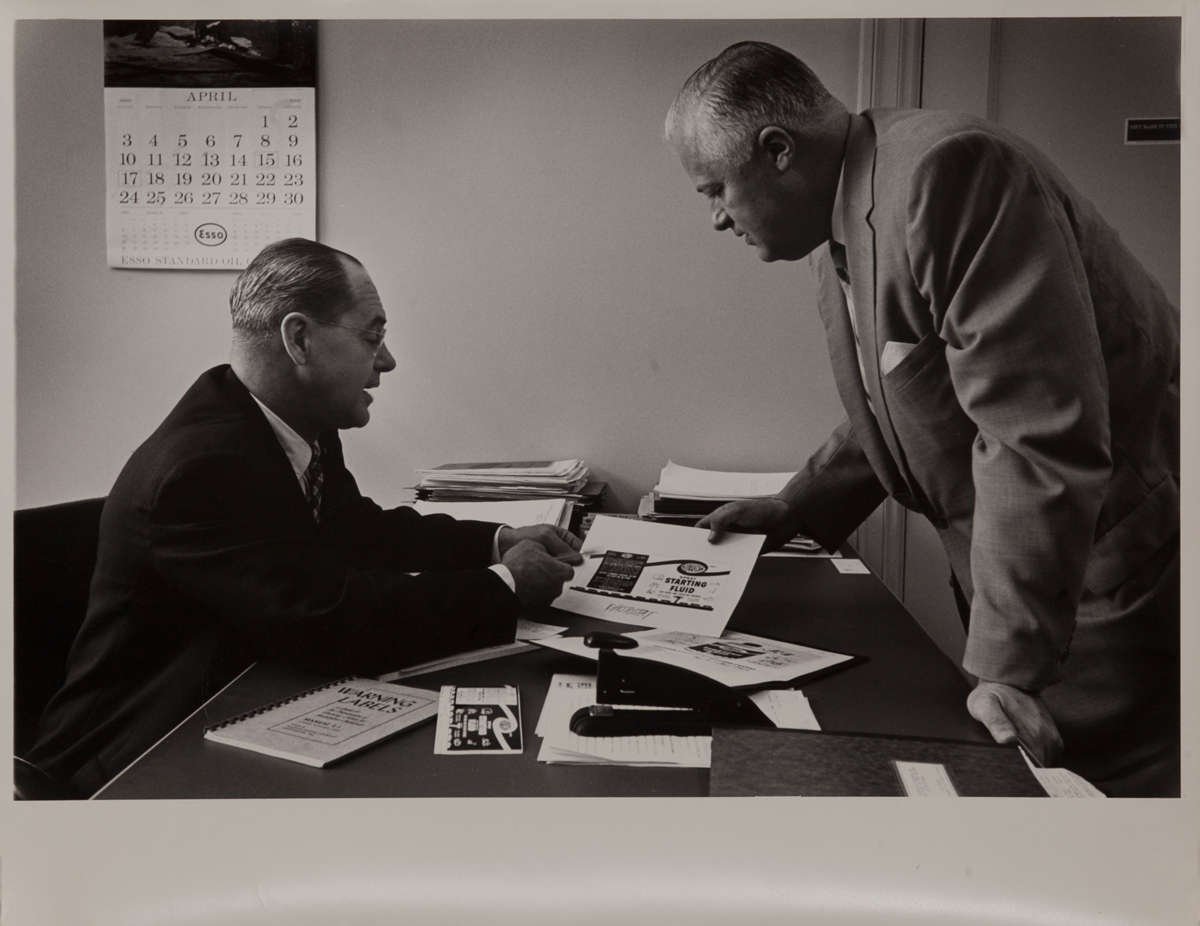Dupont corporate communication photograph, executives discuss marketing plan 